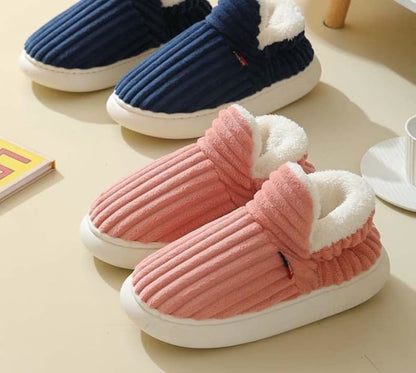 The Sherpa-Lined Slippers That Keep Your Feet Warm & Safe All Winter Long
