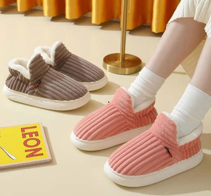 The Sherpa-Lined Slippers That Keep Your Feet Warm & Safe All Winter Long